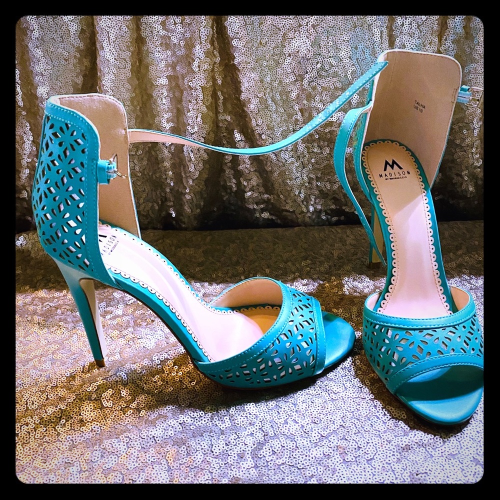 Bright teal high heel.